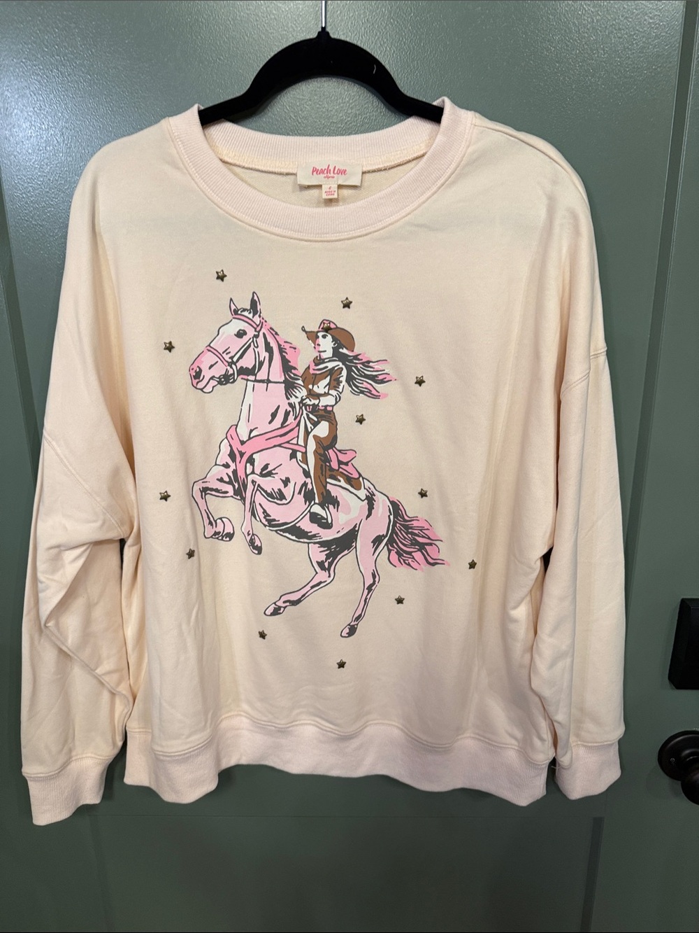 Peach Love California Cream Sweatshirt with Pink Horse Rider Graphic